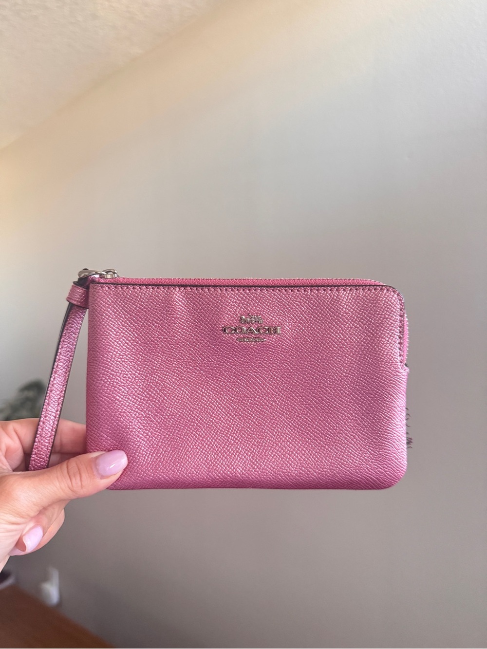 Pink coach wristlet